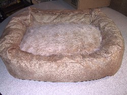 this bed has a golden fur on one side and buckskin micro-suede for the other